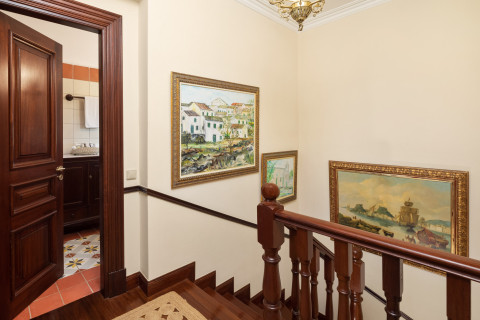 Elegant wooden staircase to upper floor