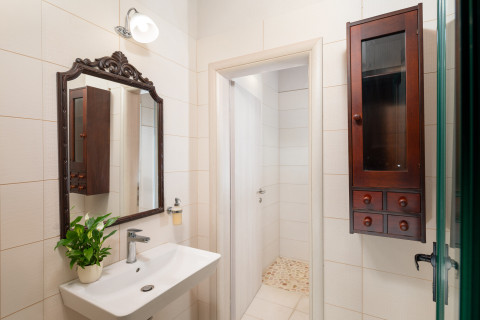 Night view of pool and terrace area