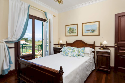 Master bedroom with balcony access